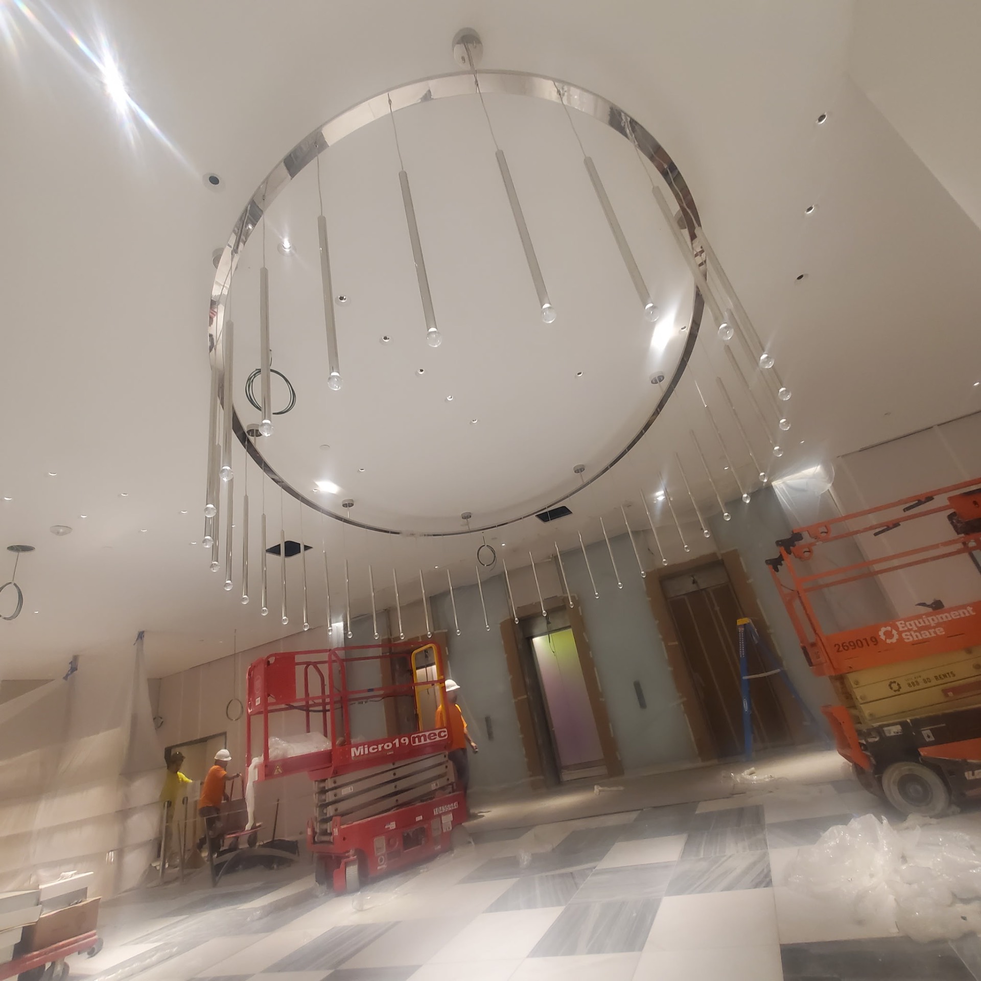 Custom Ring Chandelier — Lobby Install